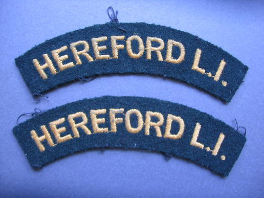 A set of Hereford Light Infantry shoulder titles