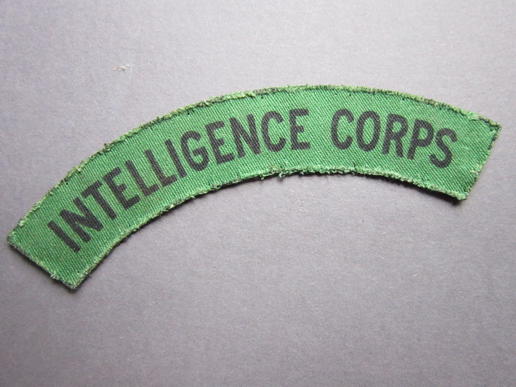 Nice and difficult to find printed shoulder title to the Intelligence Corps