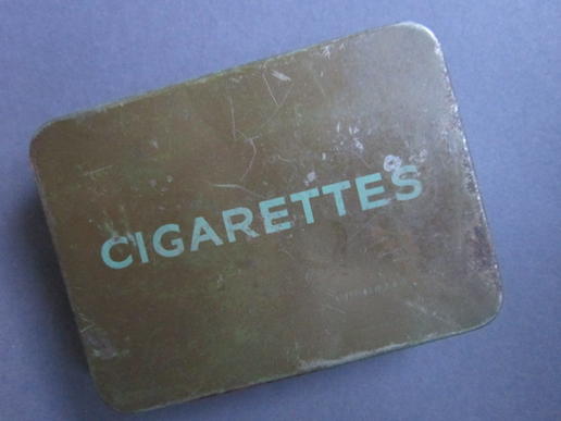 A nicely used British/Canadian standard issue CIGARETTES pocket tin