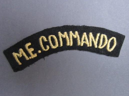 This is a perfect example of a British Middle East Commando shoulder title