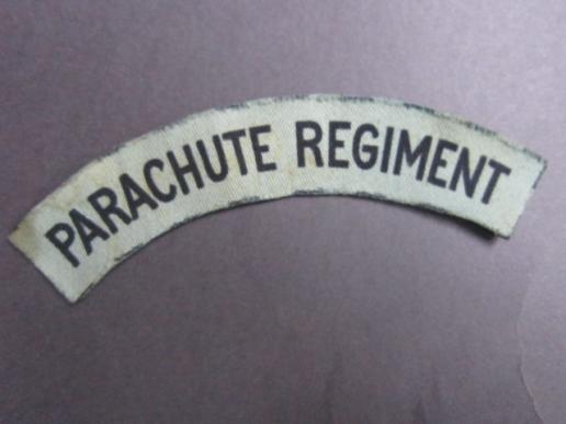 This is a neat example of a nicely un-issued and difficult to find printed Parachute Regiment shoulder title 