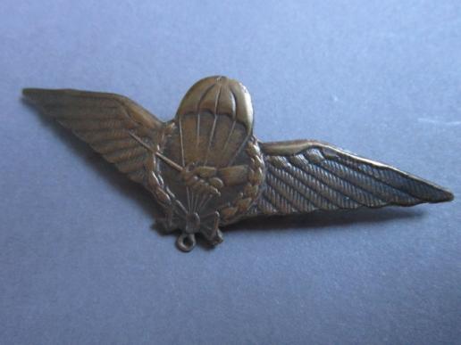 A RARE and sought after example of a Dutch East Indies School Opleiding Parachutisten metal parachute qualification wing