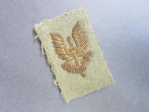 A nicely used and issued and not so often seen early post war 1st Belgian Special Air Service Parachute Regiment shoulder patch for Officers in gold bullion 