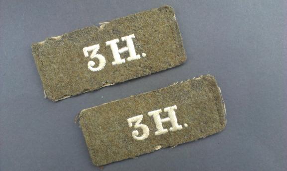 A perfect un-issued set of British First World War 3H (3rd The King's Own Hussars) slip-on shoulder titles