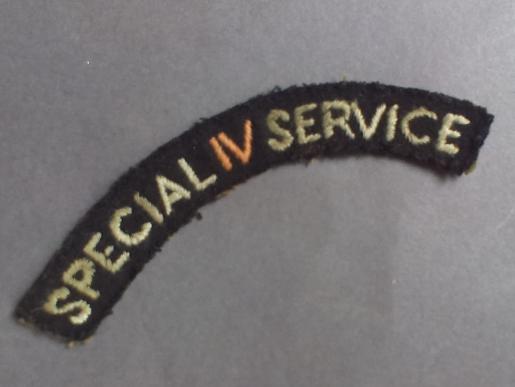 A rare and difficult to find very early Special IV Service (4 Commando) shoulder title
