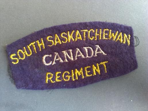 A nice un-issued Canadian made South Saskatchewan Regiment, 2nd Division shoulder title 