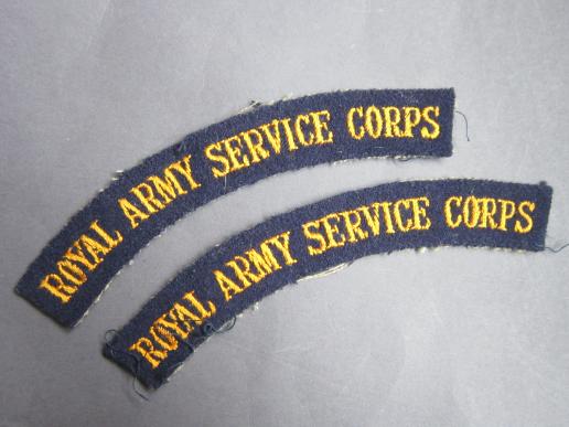 A nice and un-issued set of 'serif' type lettering Royal Army Service Corps shoulder titles