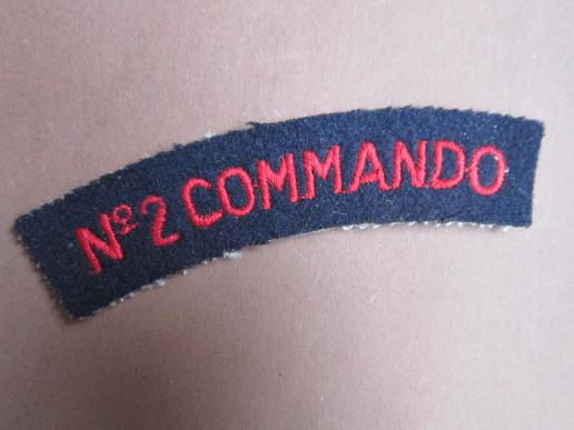 A unusual example of a British/USA made No.2 Commando shoulder title