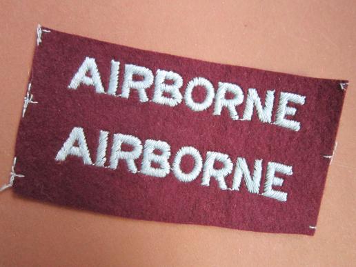 A nicely un-issued set of embroided Airborne strips