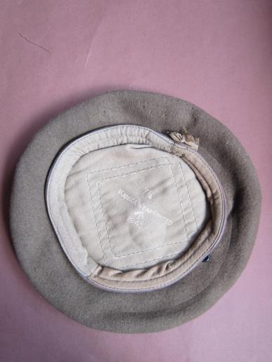 A near mint i.e. un-issued British Kangol Wear Limited 1945 dated khaki beret 
