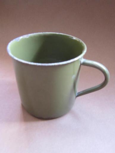 A nice and difficult to find late '30 early '40 standard issued green enamel mug 