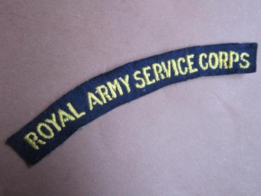 A perfect RASC (Royal Army Service Corps) hand embroided a so called full block lettering shoulder title