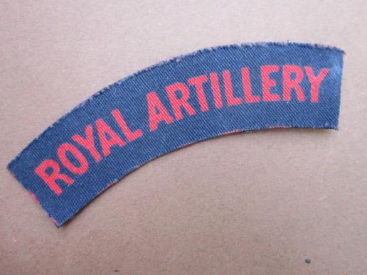 A nice un-issued printed Royal Artillery shoulder title