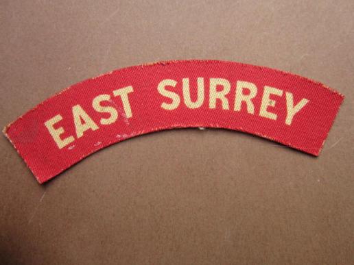 A nice and un-issued printed East Surrey Regiment shoulder regiment
