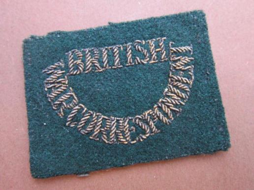 A neat and scarce example of a bullion type British War Correspondent slip on i.e shoulder title