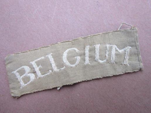 A nice late war i.e early post war 'cash tape' type Belgium shoulder title