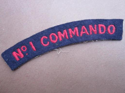 A good example of a nicely worn and issued No.1 Commando shoulder title