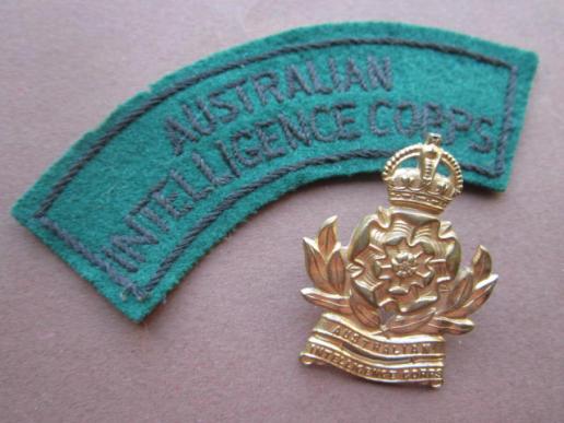 A nice set of a just post war Australian Intelligence Corps cap badge and a shoulder title