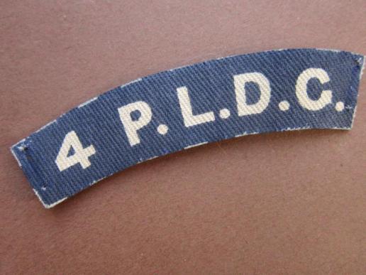 A nice un-issued printed British made Canadian 4th P.L.D.G. (Princess Louise Dragoon Guards) shoulder title