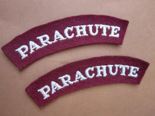 A nice perfect and un-issued matching set of mid war period PARACHUTE paste i.e glue back shoulder titles