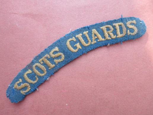 A nice and early embroided Scots Guards shoulder title