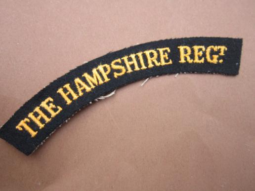 A nice un issued embroided The Hampshire Regiment shoulder title