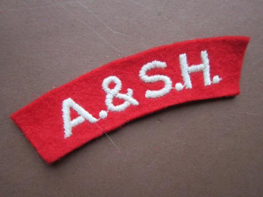A neat example of a nice white on red embroided A.&S.H. (Argyll and Sutherland Highlanders) shoulder title