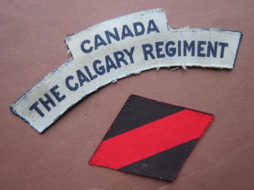 A nice and neat set of British made printed badges to the Canadian Calgary Regiment