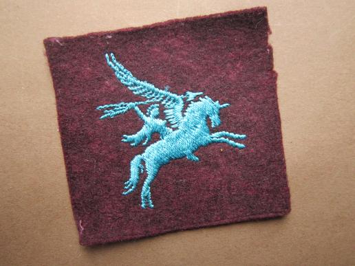 A nice single right facing embroided Airborne 'Pegasus' Division shoulder formation sign