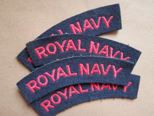 A nice red on black embroided Royal Navy shoulder title 