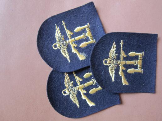 A nice World War Two Royal Navy Combined Operations arm badge in yellow 