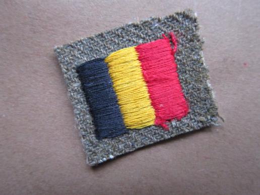 A nice little Belgium national flag as intended to wear by Belgium volunteers on there upper arm of there battle-dress blouse