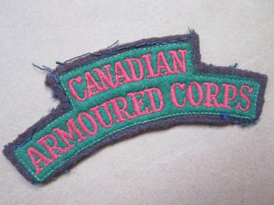A nicely issued Britis/Canadian made Canadian Armoured Corps shoulder title