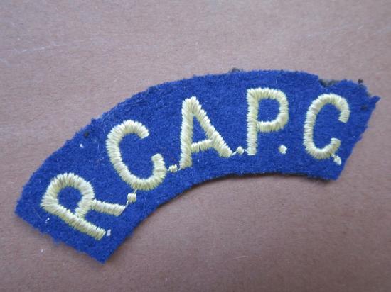 A nice British/Canadian made R.C.A.P.C (Royal Canadian Army Pay Corps) embroided shoulder title