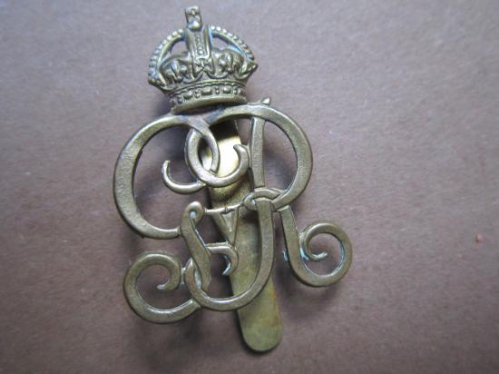 A George the V second type Military Provost Staff Corps cap badge