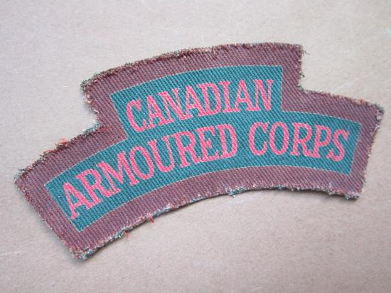A neat example a nicely issued British made (khaki backing) printed i.e canvas Canadian Armoured Corps shoulder title