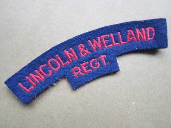 A nice example of a British made Canadian The Lincoln and Welland Regiment embroided shoulder title