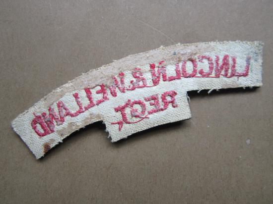 A nice example of a British made Canadian The Lincoln and Welland Regiment embroided shoulder title