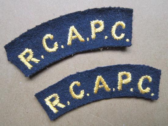 A nicely full matching British made set of R.C.A.P.C. (Royal Canadian Army Pay Corps) embroided shoulder titles