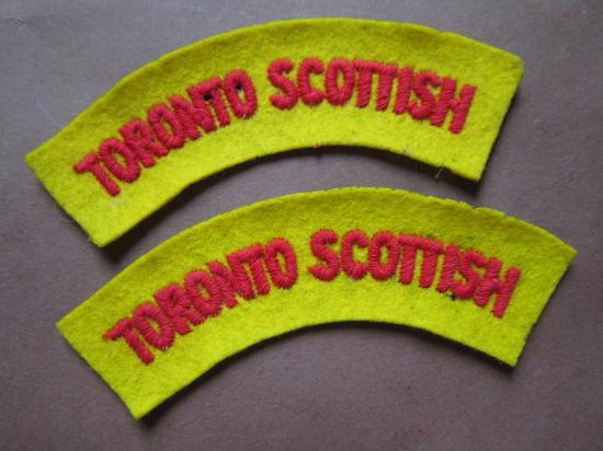 A nice British made Canadian matching set of shoulder title to the Toronto Scottish