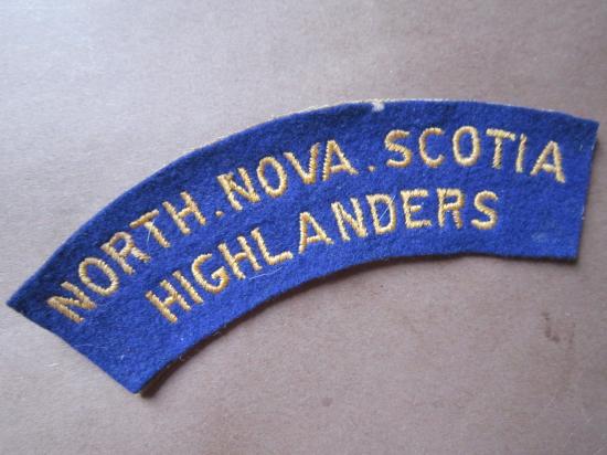 A nice mid i.e late war time period British made Canadian North Nova Scotia Highlanders embroided shoulder title