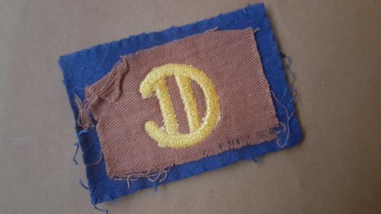 A neat example of a British/Canadian made Officers Canadian 2nd Divisional shoulder patch