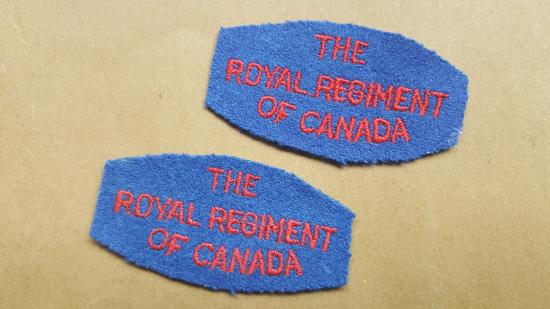 A nice matching set of a British made The Royal Regiment of Canada shoulder titles