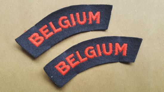 A nice full matching set of British made embroided  red on black BELGIUM shoulder titles