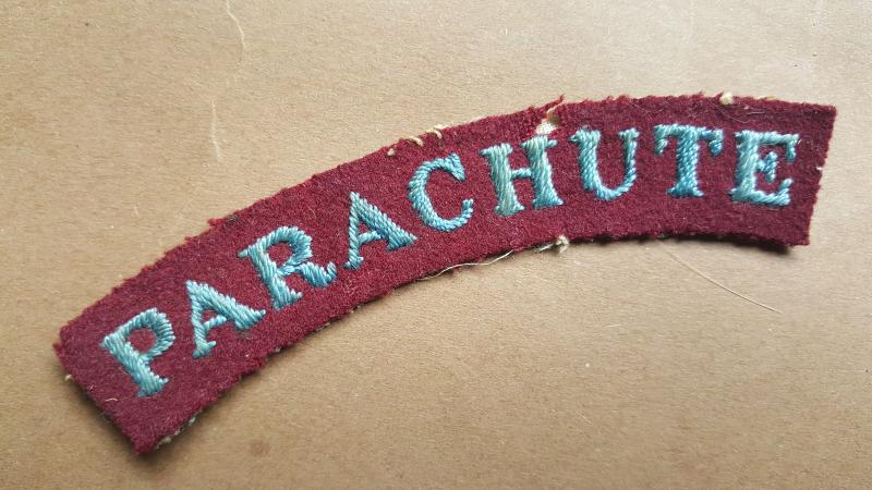 A good and early war time period so called 'cherry type' embroided serif type lettering Parachute shoulder title