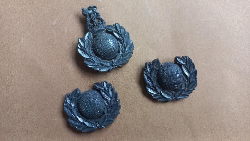 A nice set of plastic badges to the Royal Marines including a difficult to find cap badge