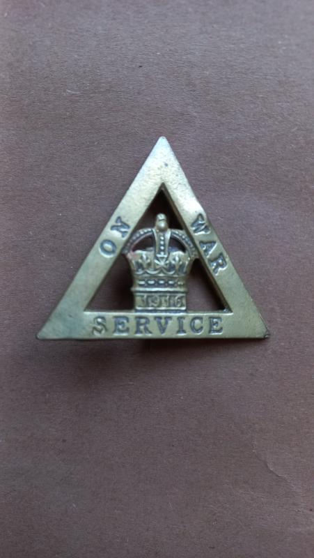 A 1916 'On War Service' Womens workers brass badge