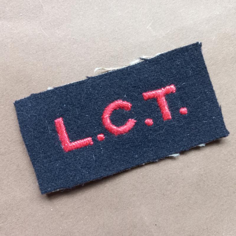 A difficult to find Royal Navy L.C.T. (Landing Craft Tanks) shoulder title i.e badge