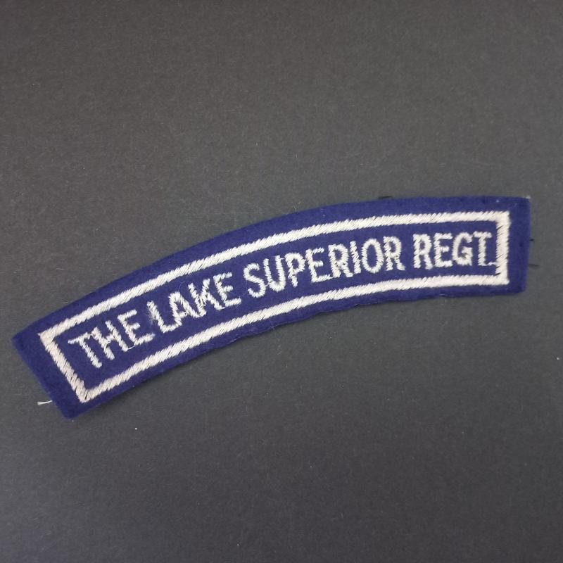 A perfect example of a typical British made Canadian The Lake Superior Regiment embroided shoulder title