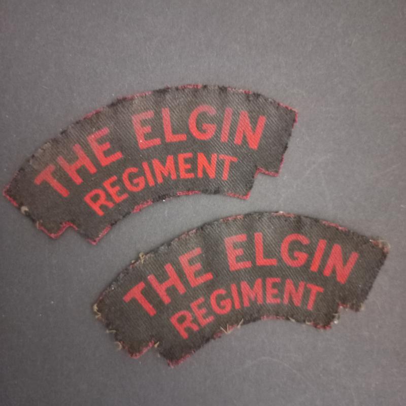 A superb atrractive and - fulling matching - set of British made printed The Elgin Regiment shoulder titles